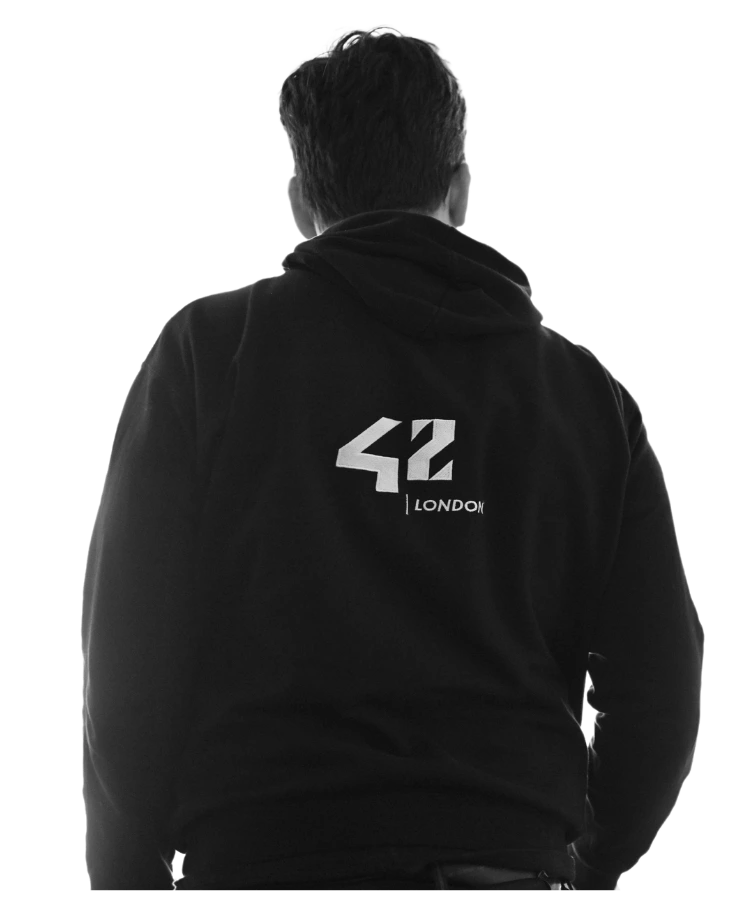 42 London Student with branded hoodie